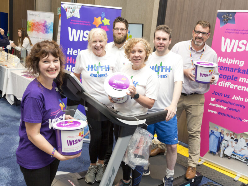 WISHH team fundraise with HUTH Harriers at Health Expo