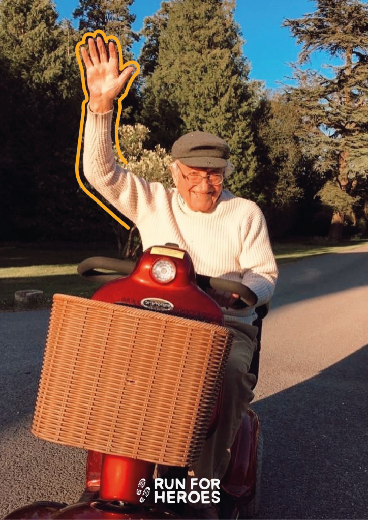 An elderly man on a mobility scooter takes part in the 5k May challenge