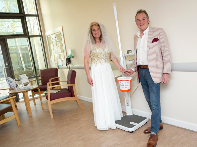 Bride and groom with scales