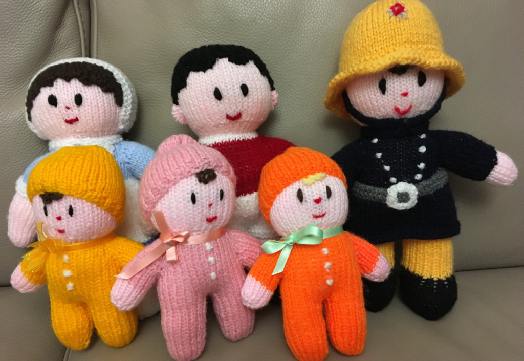 Knitted dolls made by fundraiser