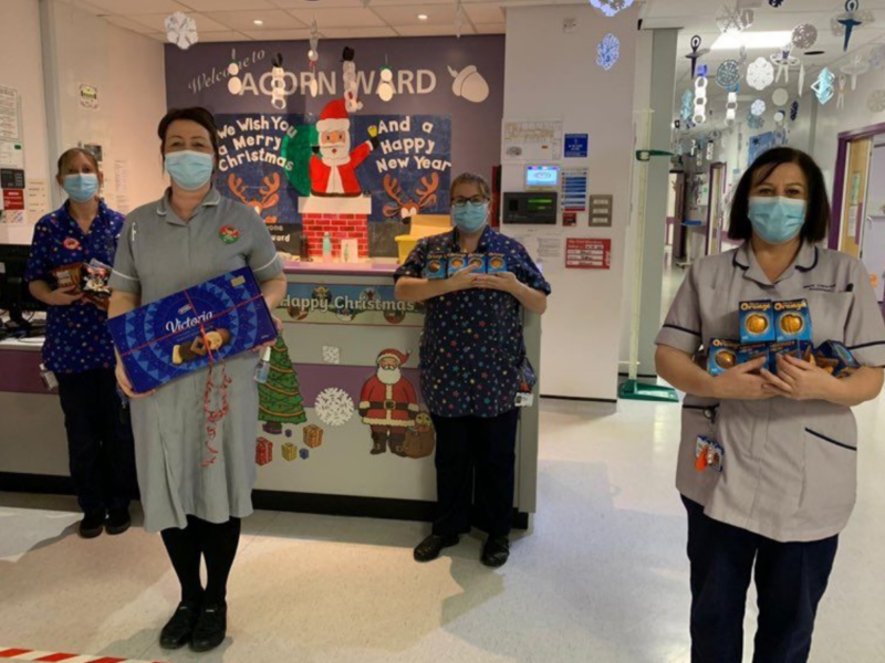 Staff accept Christmas hampers