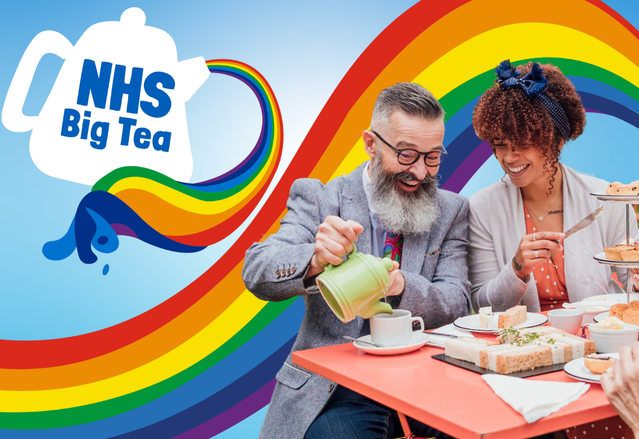 A man and a woman enjoy a tea party with tea and scones