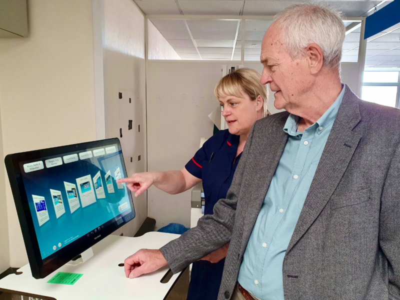 Karen Harrison demonstrates RITA to Geoff Branton of Hull Old Grammarians Lodge